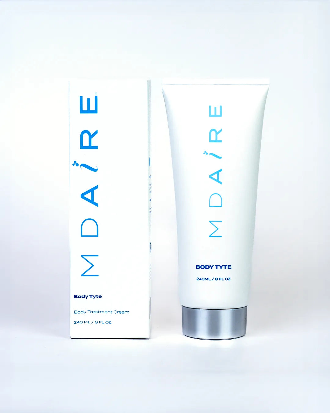 Body Tyte tube and packaging side by side in gallery position 1 with b