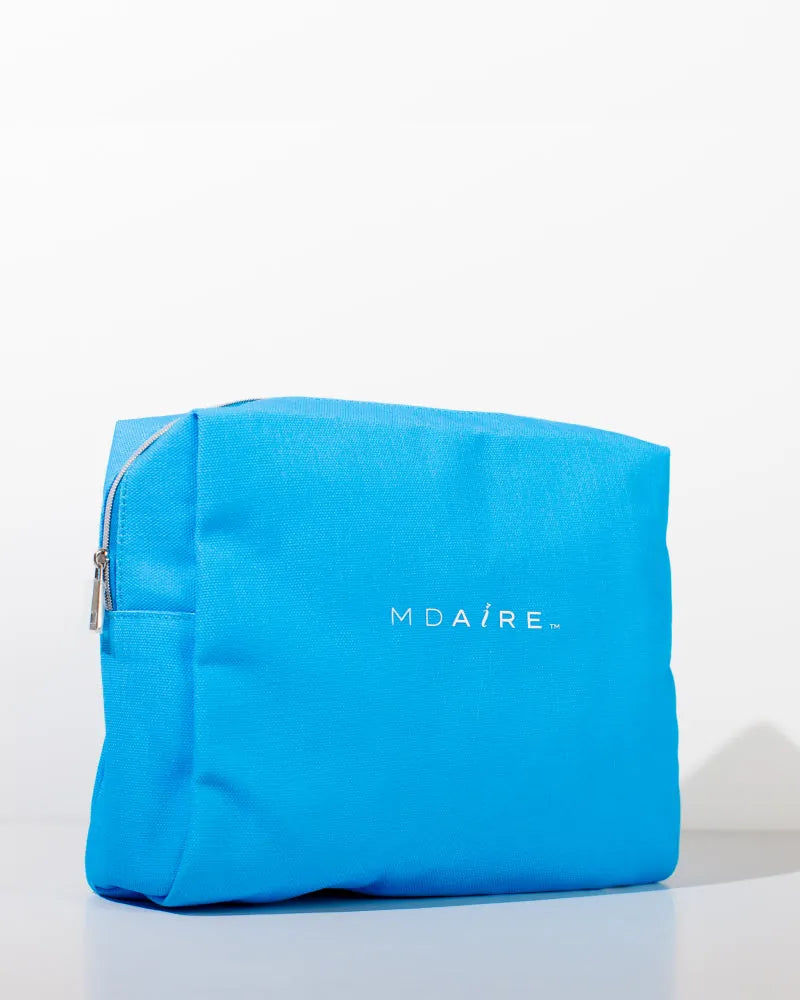 MDAiRE Cosmetic Bag in vibrant blue with logo on front, waterproof des
