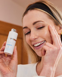 Rush Hour Duo with woman demonstrating gentle eye cream application in gallery position 1 close-up shot
